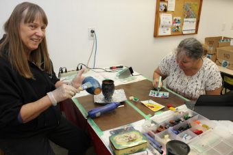 woman doing Encaustic Art